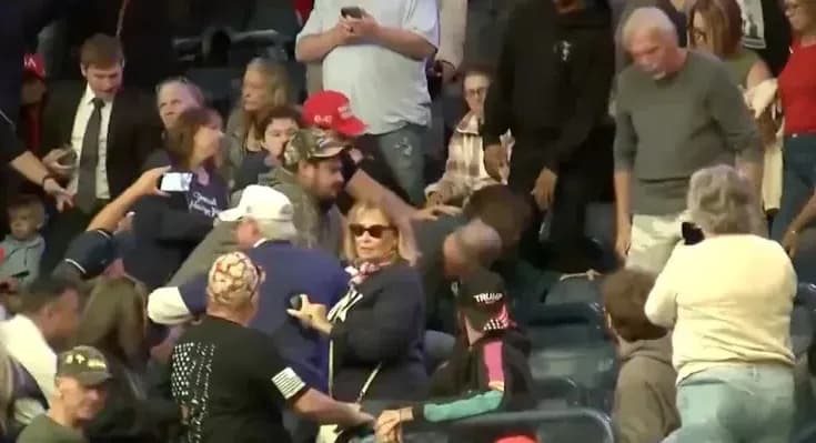 Trump Protester Gets Punched in the Face By MAGA Fan — Then Gets Roasted By Trump as She’s Dragged Out By Police in Shocking Clip